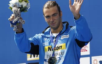 Gregorio Paltrinieri ai Mondiali di Kazan epa04878412 Gold medal winner Gregori Paltrinieri of Italy celebrates after the Men's 1500m Freestyle final at the FINA Swimming World Championships 2015 in Kazan, Russia, 09 August 2015. EPA/VALDRIN XHEMAJ