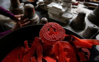 187750799 A 'Made in Italy' wax residuals sits ahead of use at Fonderia Pontificia Marinelli bell foundry in Agnone, Italy, on Monday, Nov. 11, 2013. Italy's one-year borrowing costs fell to a record low at a sale of 6.5 billion euros ($8.7 billion) of bills, the first auction after the European Central Bank unexpectedly cut its benchmark interest rate. Photographer: Alessia Pierdomenico/Bloomberg via Getty Images